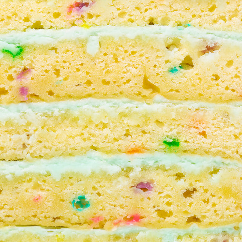 Image 4: Macro image of layers of vanilla celebration cake and SusieBlue buttercream view 4