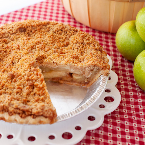 handcrafted Apple Crumble Pie by SusieCakes topped with all-butter crumble, close-up